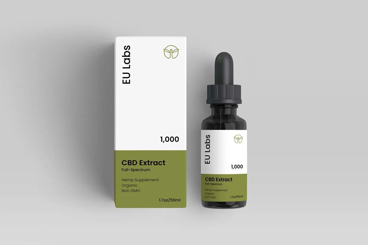 Hand holding a 1000mg full-spectrum CBD oil dropper — CBD Oil Sunshine Coast